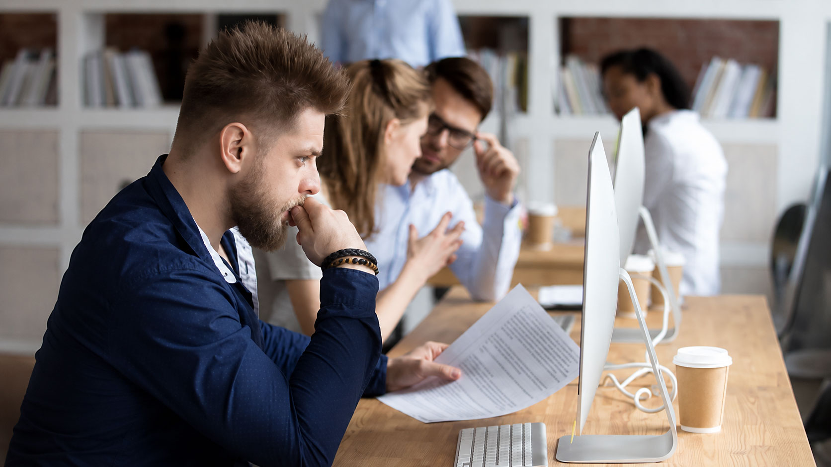 AI executive intelligence platform consultant reviewing predictive analytics with retail leadership