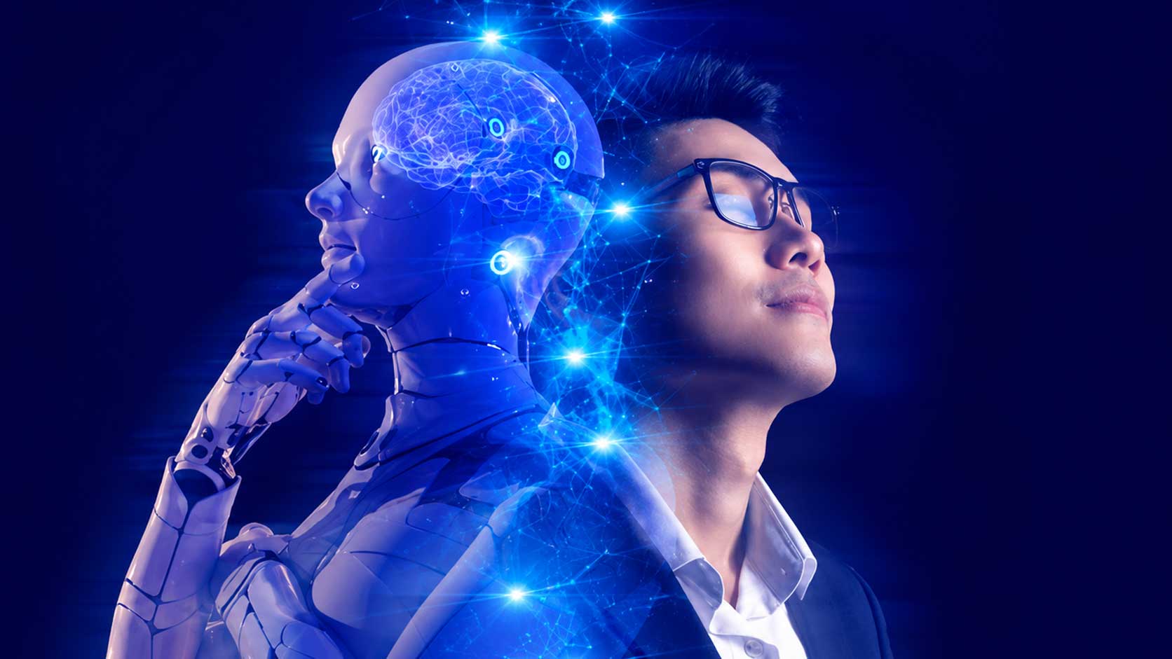 Executives and AI specialists visualising an enterprise knowledge ecosystem in a modern innovation